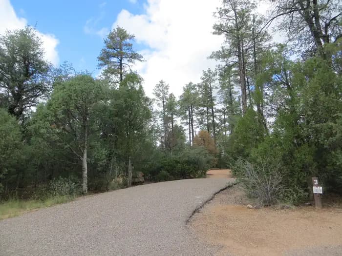 Parking space and entrance to the treed site #03, Elk Loop at Houston Mesa.