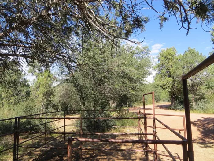 Provided horse corral and view of camping space and parking at site #12, Horse Camp, Houston Mesa.