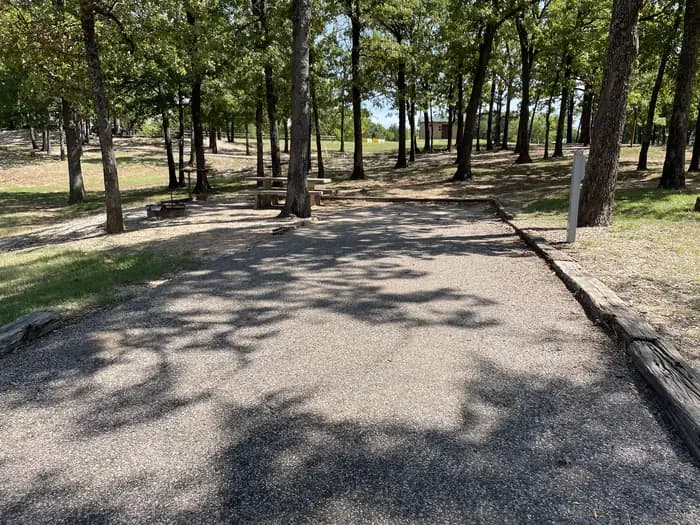 A photo of Site 08 of Loop JCRE at JOHNSON CREEK with Picnic Table, Electricity Hookup, Fire Pit, Shade, Water Hookup