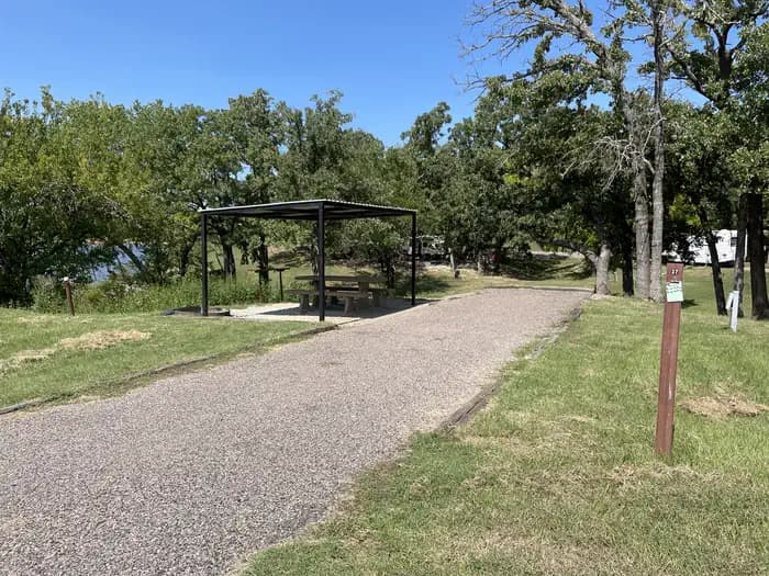 A photo of Site 37 of Loop JCRE at JOHNSON CREEK with Picnic Table, Electricity Hookup, Fire Pit, Water Hookup