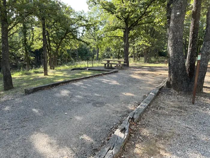A photo of Site 03 of Loop JCRE at JOHNSON CREEK with Picnic Table, Electricity Hookup, Fire Pit, Shade, Water Hookup