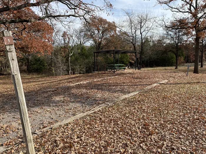 A photo of Site 01 of Loop JCRE at JOHNSON CREEK with Picnic Table, Electricity Hookup, Fire Pit, Shade, Water Hookup