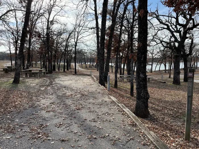 A photo of Site 29 of Loop JCRE at JOHNSON CREEK with Picnic Table, Electricity Hookup, Fire Pit, Shade, Water Hookup