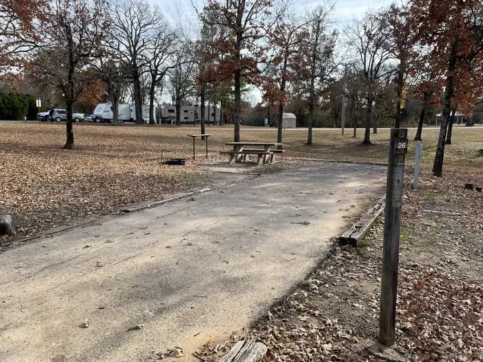 A photo of Site 26 of Loop JCRE at JOHNSON CREEK with Picnic Table, Electricity Hookup, Fire Pit, Shade, Water Hookup