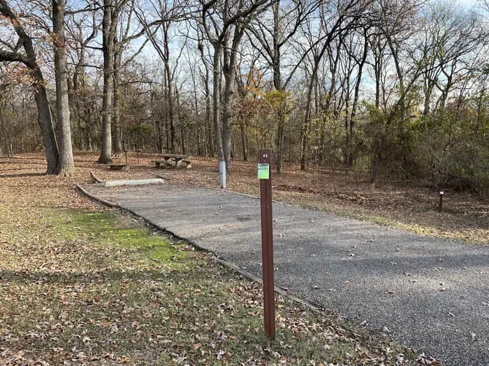 A photo of Site 46 of Loop JCRE at JOHNSON CREEK with Picnic Table, Electricity Hookup, Fire Pit, Shade, Water Hookup