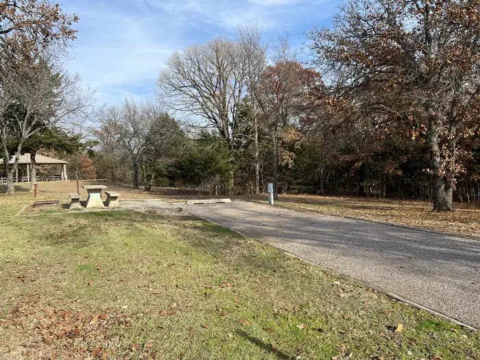 A photo of Site 43 of Loop JCRE at JOHNSON CREEK with Picnic Table, Electricity Hookup, Fire Pit, Shade, Water Hookup