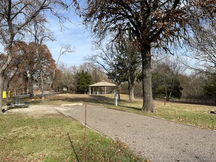 A photo of Site 42 of Loop JCRE at JOHNSON CREEK with Picnic Table, Electricity Hookup, Fire Pit, Shade, Water Hookup
