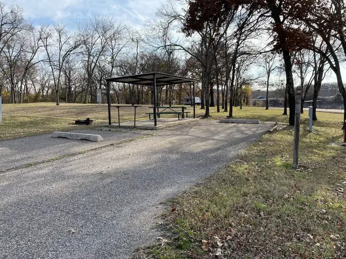 A photo of Site 52 of Loop JCRE at JOHNSON CREEK with Picnic Table, Electricity Hookup, Fire Pit, Shade, Water Hookup